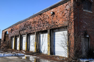 Abandoned building against clear sky