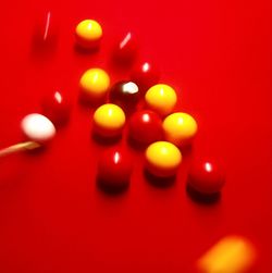 High angle view of red candles on table