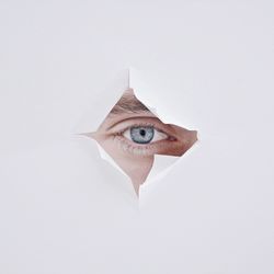 Close-up of paper over white background