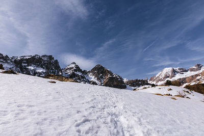 Snow covered mountain against sky