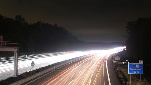 Light trails on road at night