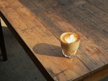High angle view of coffee latte on table