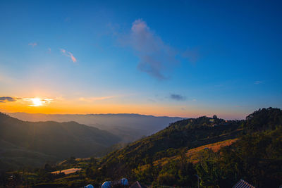 Sunrise in mountain on viewpoint at doi pha tang chiang rai province, thailand