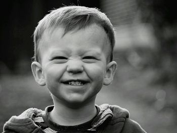 Cute happy boy with snotty nose