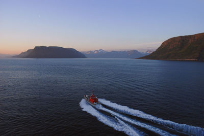 Boat in sea against clear sky