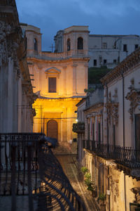 Exterior of temple against sky in city