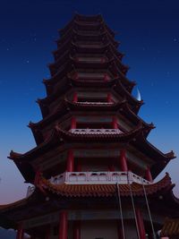 Low angle view of pagoda against sky