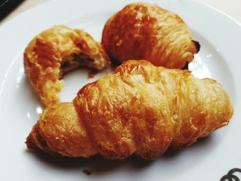 Close-up of croissant on plate