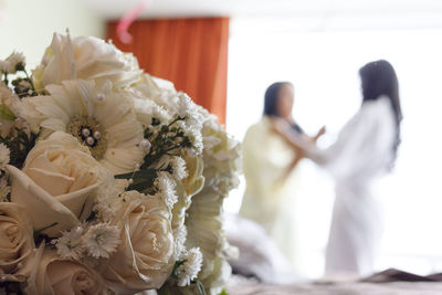 People on white flowering plants