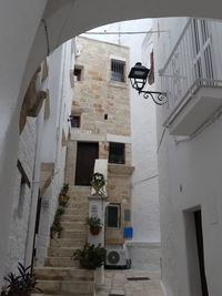 Low angle view of side street, polignano a mare, puglia, italy 2022