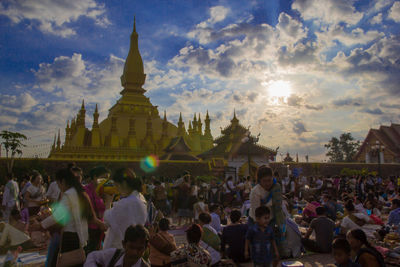 Group of people in temple against building