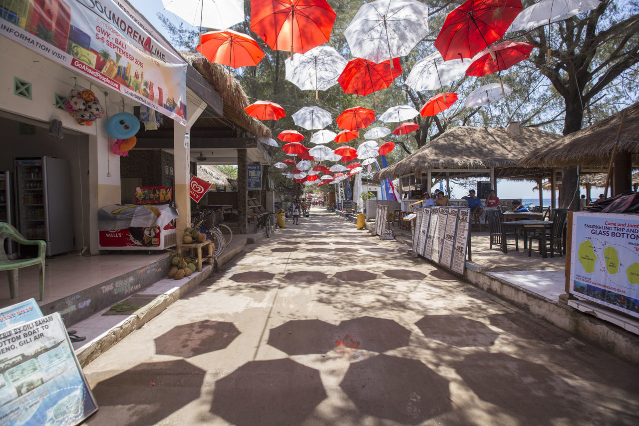 LANTERNS HANGING ON FOOTPATH