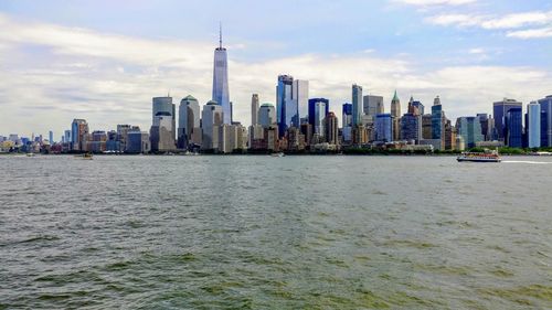 View of buildings in city at waterfront