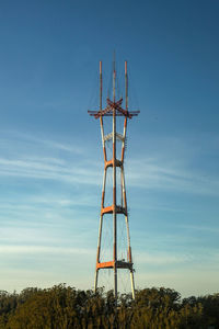 Low angle view of communications tower against sky