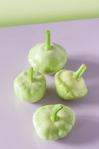 Close-up of green fruits on table