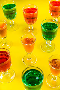 Close-up of wine glasses on table