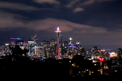 Illuminated buildings in city at night