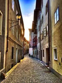 Street amidst residential buildings