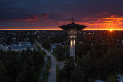 High angle view of buildings against sky during sunset