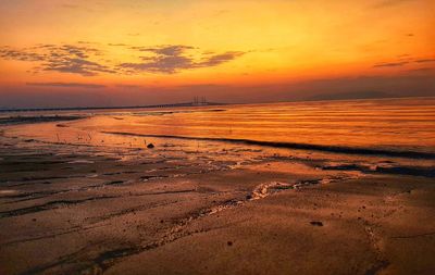 Scenic view of beach during sunset