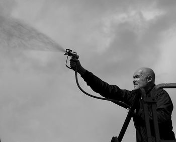 Low angle view of statue against sky