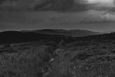 Scenic view of land against sky