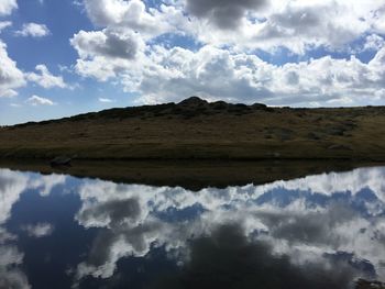 Low angle view of land against sky