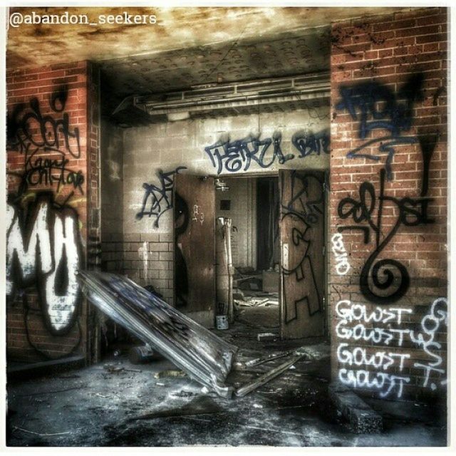 text, graffiti, western script, communication, wall - building feature, architecture, built structure, transfer print, auto post production filter, wall, capital letter, art, vandalism, non-western script, street art, creativity, art and craft, building exterior, door, information