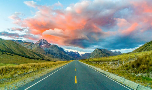 Road amidst landscape against sky