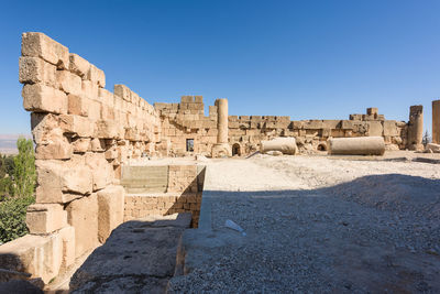 Old ruins against clear blue sky