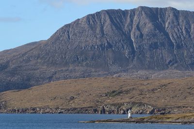 Lighthouse and the mountains of the highlands