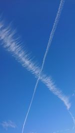 Low angle view of vapor trail in sky