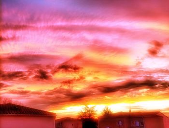 Low angle view of cloudy sky at sunset