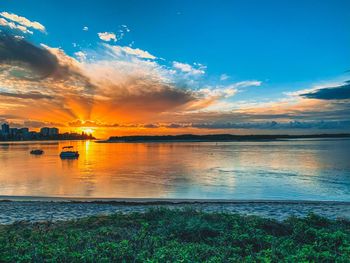 Scenic view of sea against sky during sunset