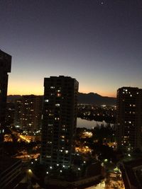 Illuminated cityscape at night