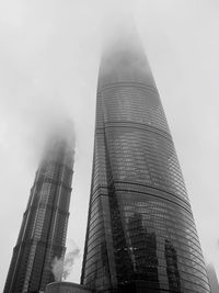 Low angle view of modern buildings against sky