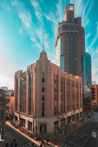 Buildings in city against sky