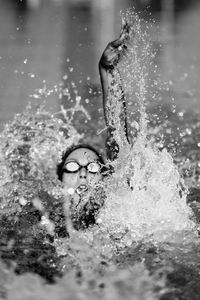 Woman swimming in pool