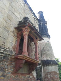 Low angle view of old building against sky