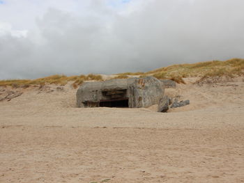 Built structure on land against sky