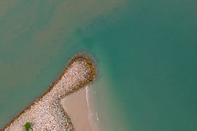 High angle view of surf on beach