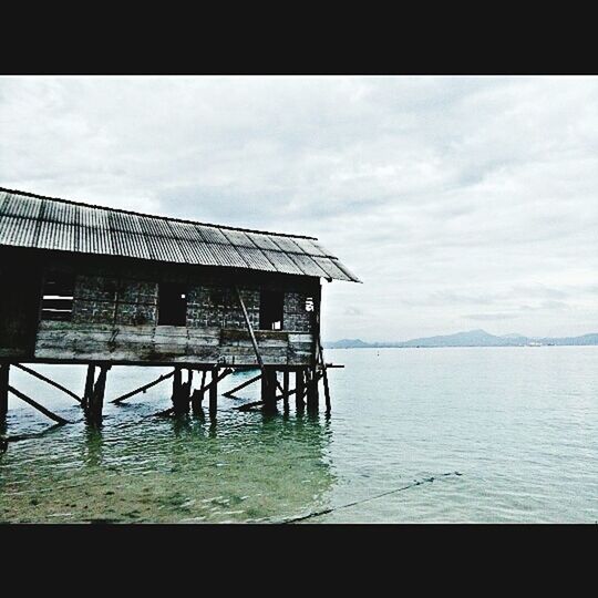 GAZEBO IN SEA AGAINST SKY