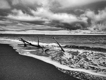 Scenic view of beach against sky