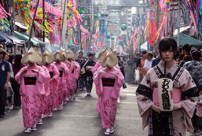 Group of people standing in city