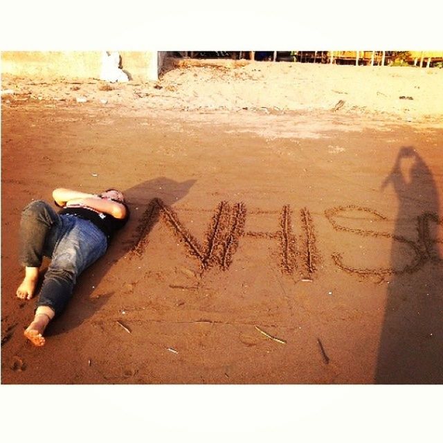 low section, shoe, sand, transfer print, auto post production filter, person, high angle view, footwear, human foot, day, shadow, part of, beach, outdoors, abandoned, dirty, sunlight