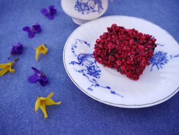 High angle view of flowers in plate on table