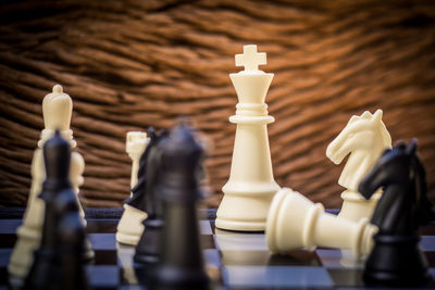 Close-up of chess pieces on board