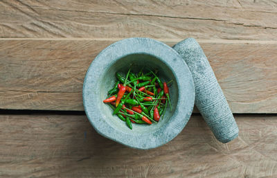 High angle view of chopped vegetables in bowl on table