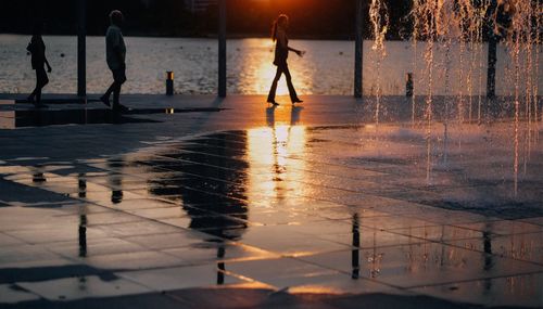 People on beach at night