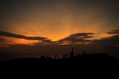 Silhouette of building during sunset